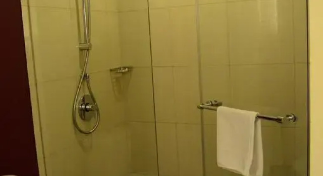 Номер Deluxe M-Regency Hotel Makassar