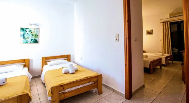 Четырёхместные апартаменты c 1 комнатой с видом на сад Zygos Apartments