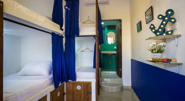 Кровать в общем номере Casa del Puerto Hostel & Suites