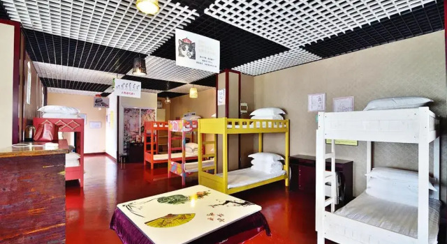 Кровать в общем номере Country Utopian Inn