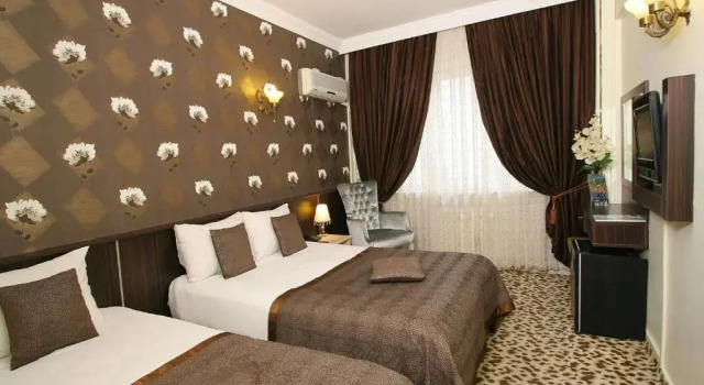 Трёхместный номер Maya Hotel