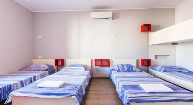 Кровать в общем номере (мужской номер) Hostel Sunset