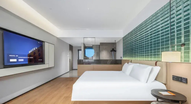Номер Comfort Liangzhi Huipin Hotel