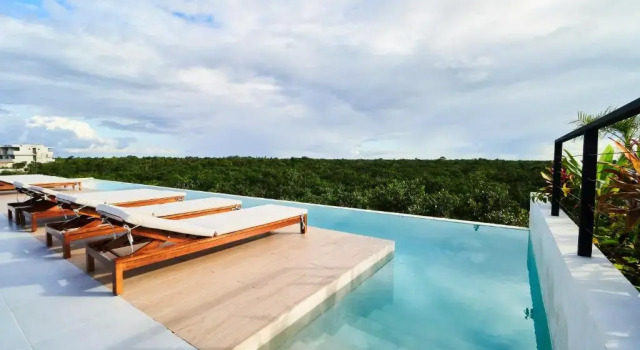 Апартаменты Spacious Trendy Apartment Breathtaking Terrace & Infinity Pool Lounge & Yoga Area