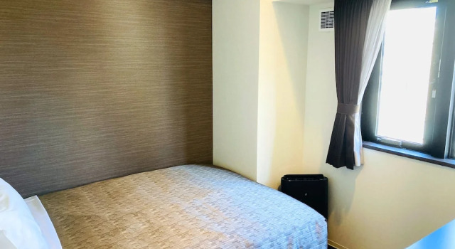Одноместный номер Business HOTEL LiVEMAX Sendai Hirosedori