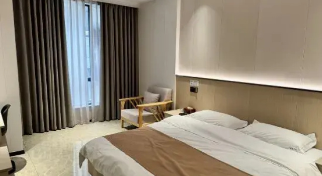 Люкс Deluxe Xinshi Town Tianxinju Inn