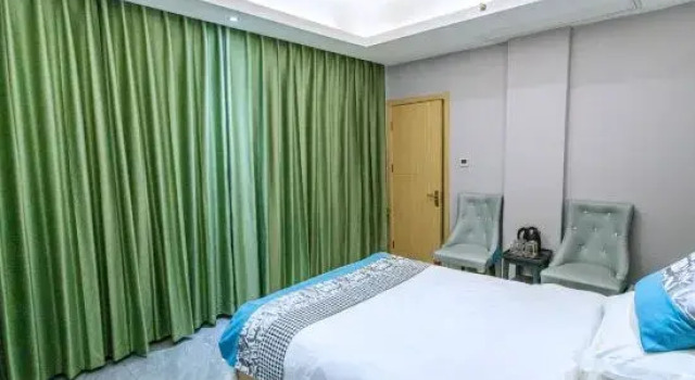 Люкс Deluxe Tuwo Holiday Hotel (You County Bus Terminal)