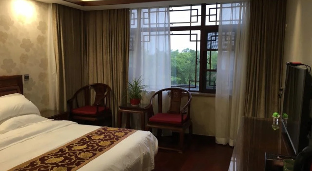 Gujing Hotel(太湖三山岛古井山庄), Забронировать Отель Сучжоу Китай