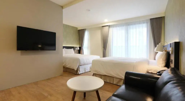 Standard Neljän hengen huone KUN Tour Hotel Feng Chai