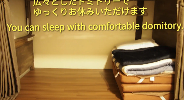 Кровать в общем номере Tabinoyado MatsueGuesthouse