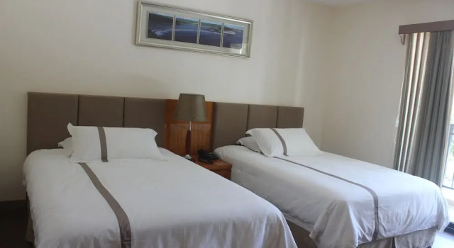 Четырёхместный номер Deluxe с видом на океан Saipan Beach Hotel