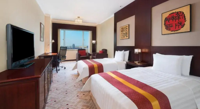 Четырёхместный номер Deluxe Crowne Plaza Shanghai Pudong by IHG
