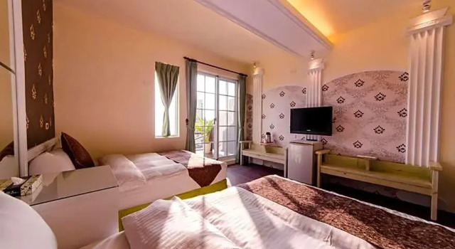 Четырёхместный номер Standard с балконом Da Wan Hostel