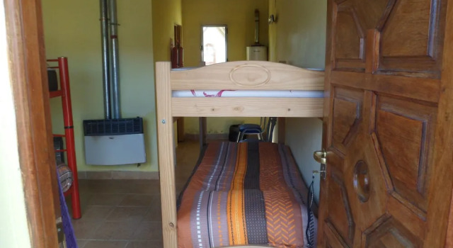 Кровать в общем номере Milenarios Hostel
