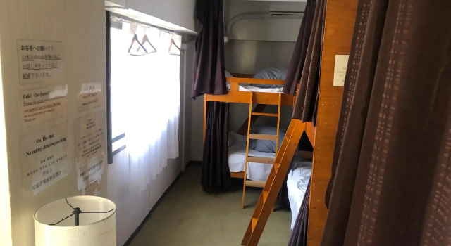 Кровать в общем номере guesthouseM104kagoshima