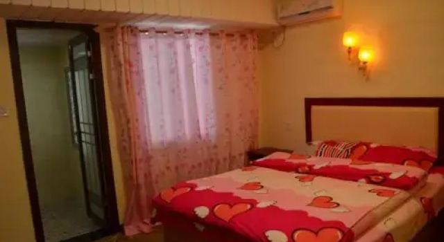 Zhangjiajie Xiangli Happy Homestay, Забронировать Отель Jiawan Хунань
