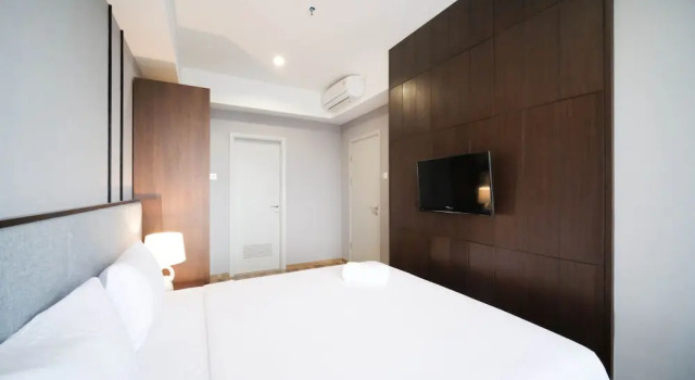 Апартаменты Tidy And Spacious 2Br At Grand Sungkono Lagoon Apartment