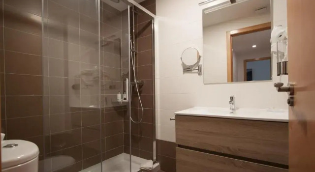 Апартаменты Cuquiellu. Apartamento con piscina