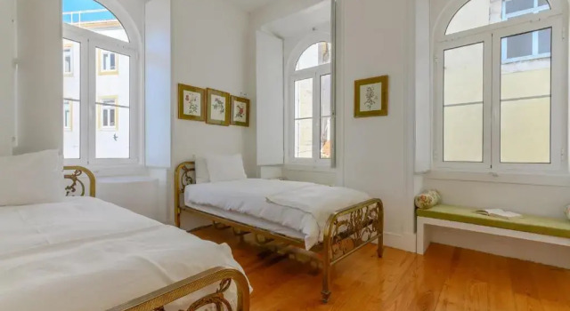 Апартаменты Portas do Castelo Apartments