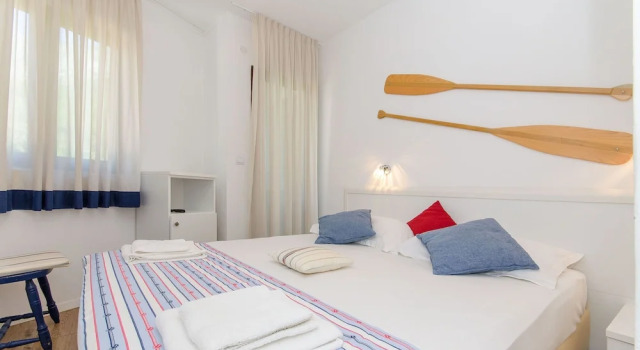 Апартаменты Apartments Beach House Paradiso