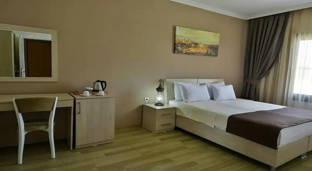 Четырёхместный номер Standard с балконом Bon Hotel City & Resort