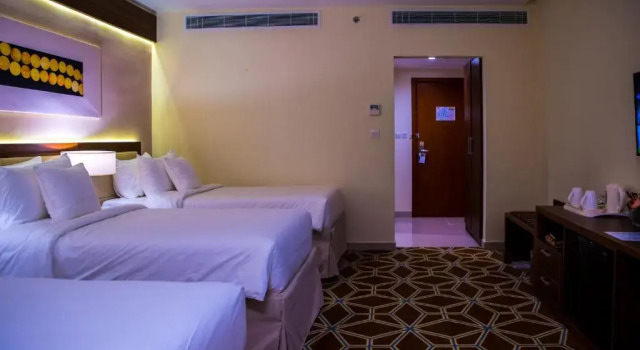 Трёхместный номер Blue Coral Hotel