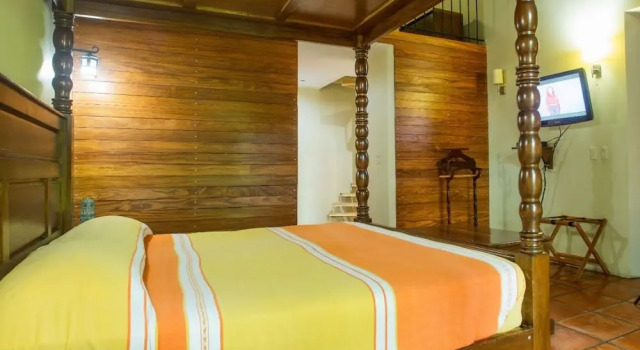 Кровать в общем номере Hotel Boutique Hacienda del Gobernador