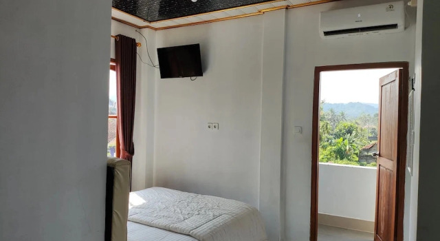 Camera doppia Deluxe con balcone Penginapan Nurmega jaya