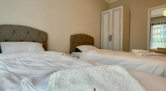 Семейные апартаменты с 4 комнатами с видом на море Shahin Golden Hotel الصقر الذهبي للشقق الفندقية