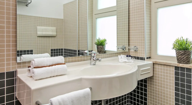 Четырёхместный номер Deluxe Hotel Olimpico