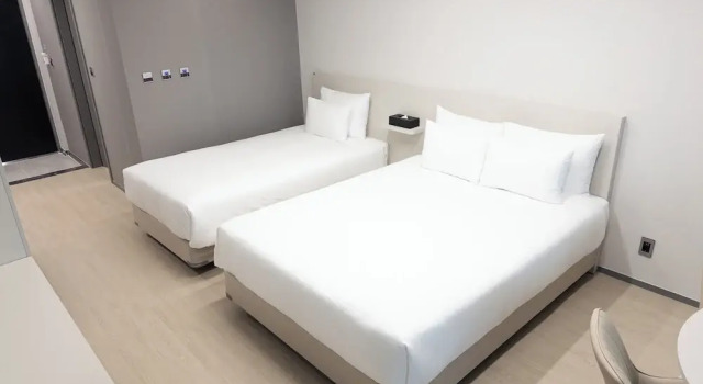 Standard dublă familie cameră cu balcon și cu vedere parțială la ocean Hotel Wavellent Yangyang