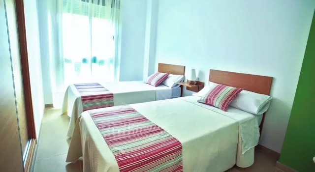 Семейные апартаменты с 2 комнатами с балконом Apartamentos El Palmeral de Madaria