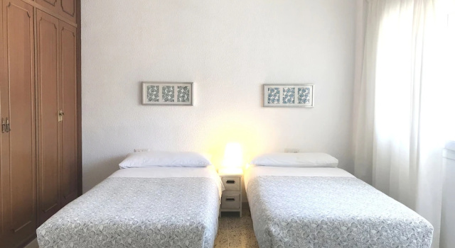 Кровать в общем номере с 6 комнатами APARTAMENTOS LA MUNDIAL - Alojamiento en Málaga capital
