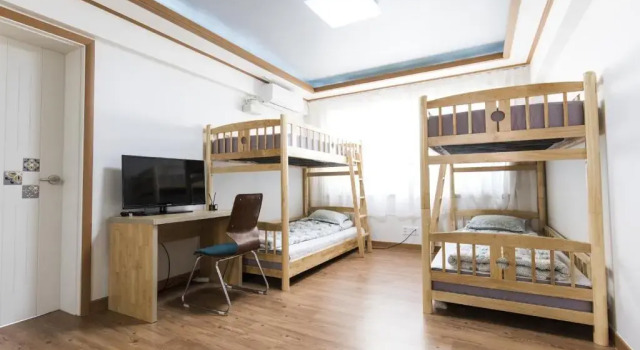 Кровать в общем номере Kory Guesthouse