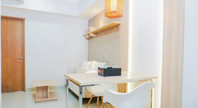 Clean and Elegant 1BR at The Oasis Apartment