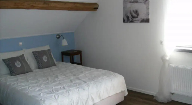 Номер Deluxe Bed op de Reth