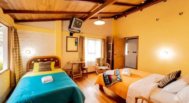 Трёхместный номер Standard с балконом и с красивым видом из окна Isla de Baños Hosteria y Spa
