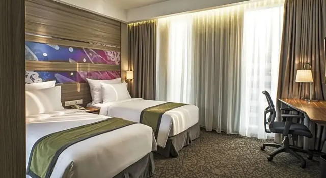 Одноместный номер Deluxe Hotel GranDhika Iskandarsyah