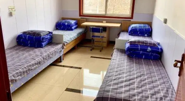 Кровать в общем номере Tianjin Tu'an Hotel