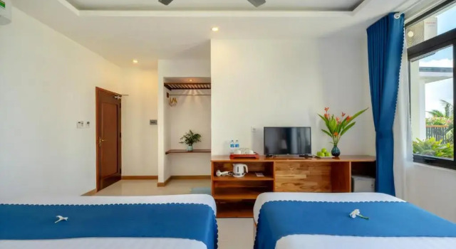 Трёхместный номер Deluxe с балконом и с видом на реку Sands River Hoi An Villa