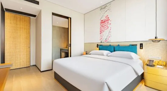 Четырёхместный семейный люкс с 2 комнатами Mochi Hotel Ningbo Xikou