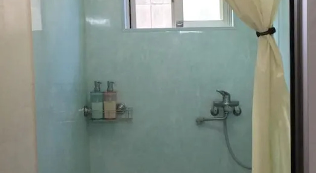 Кровать в общем номере Housei