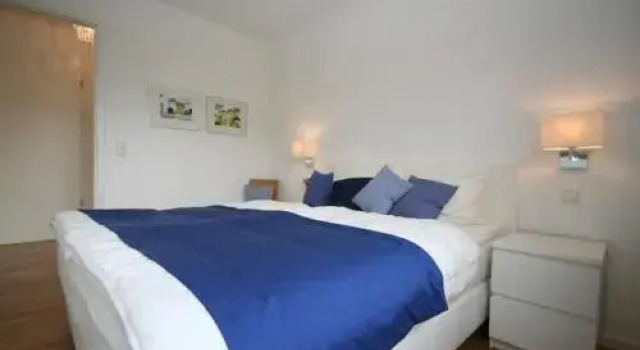 Ferienwohnung Stranddüne B 10, Забронировать Отель Шарбойц Holstein Switzerland, рядом с Пляж Hundestrand
