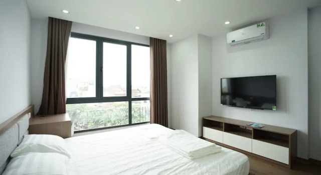 Апартаменты Deluxe c 1 комнатой с балконом ARL Trinh Cong Son Hotel