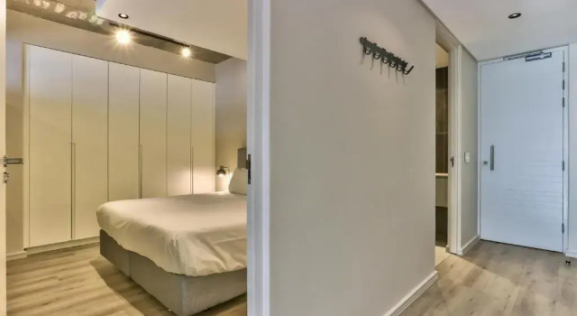 One Bedroom With Balcony and City Views