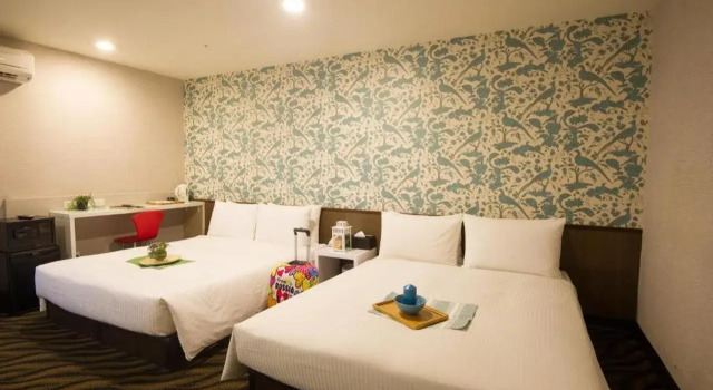 Ximen Holiday Fun Hotel, Prenota Hotel Taybey Cina