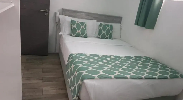 Suite 2 Schlafzimmer mit Gartenblick La Mariposa