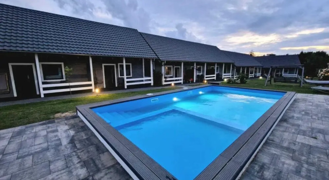 Коттедж Air-conditioned holiday homes, summer pool, Rewal