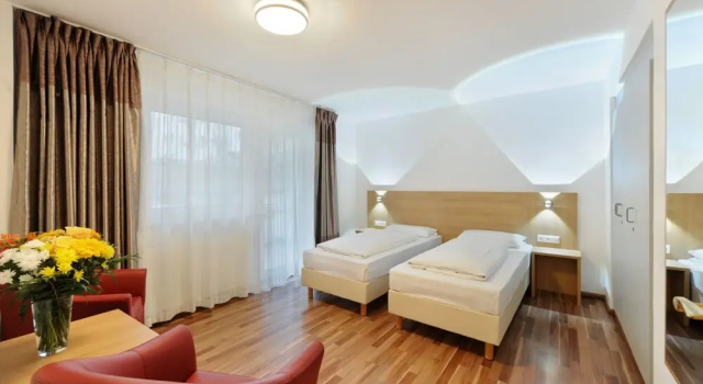 Четырёхместный номер Standard Bellevue Hotel