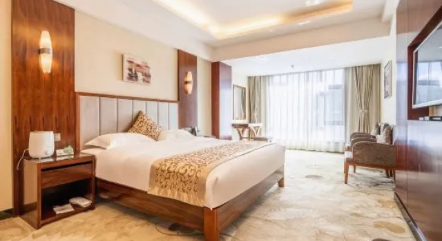 Люкс Deluxe Xiahe Jiusheng international Hotel